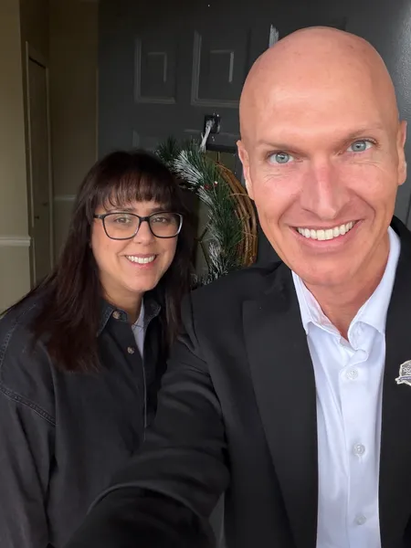 Kyle with a happy homeowner